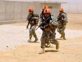 LR student Nikolai Patterson runs through a training exercise in the military.